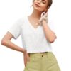 women wearing a white V-neck crop top