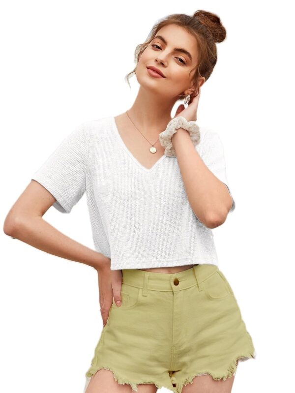 women wearing a white V-neck crop top