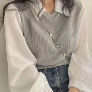 Woman wearing a Grey V-Neck Long Sleeve Rayon Top