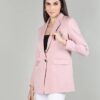 women wearing a pink blazer