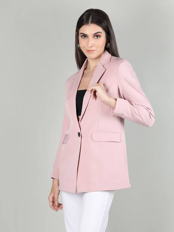 women wearing a pink blazer