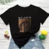a black cotton blend t-shirt with printed text is Melanin